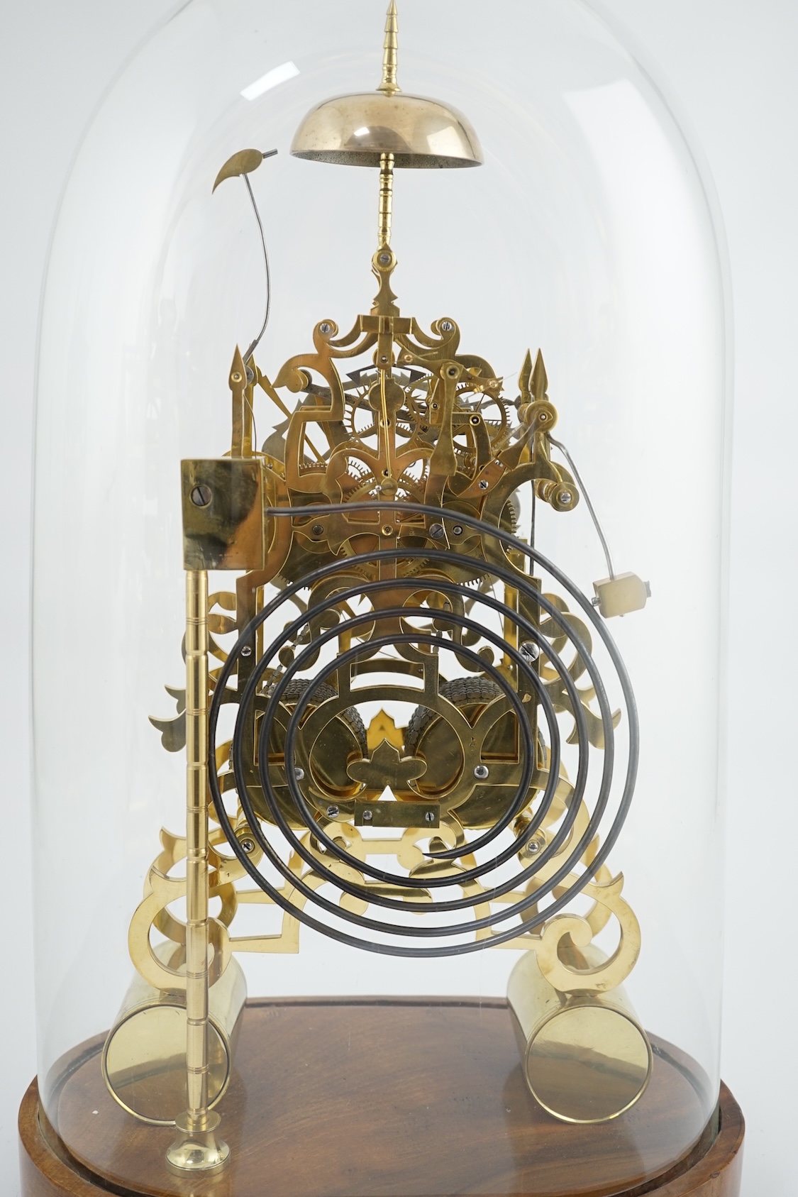 A Victorian brass skeleton clock